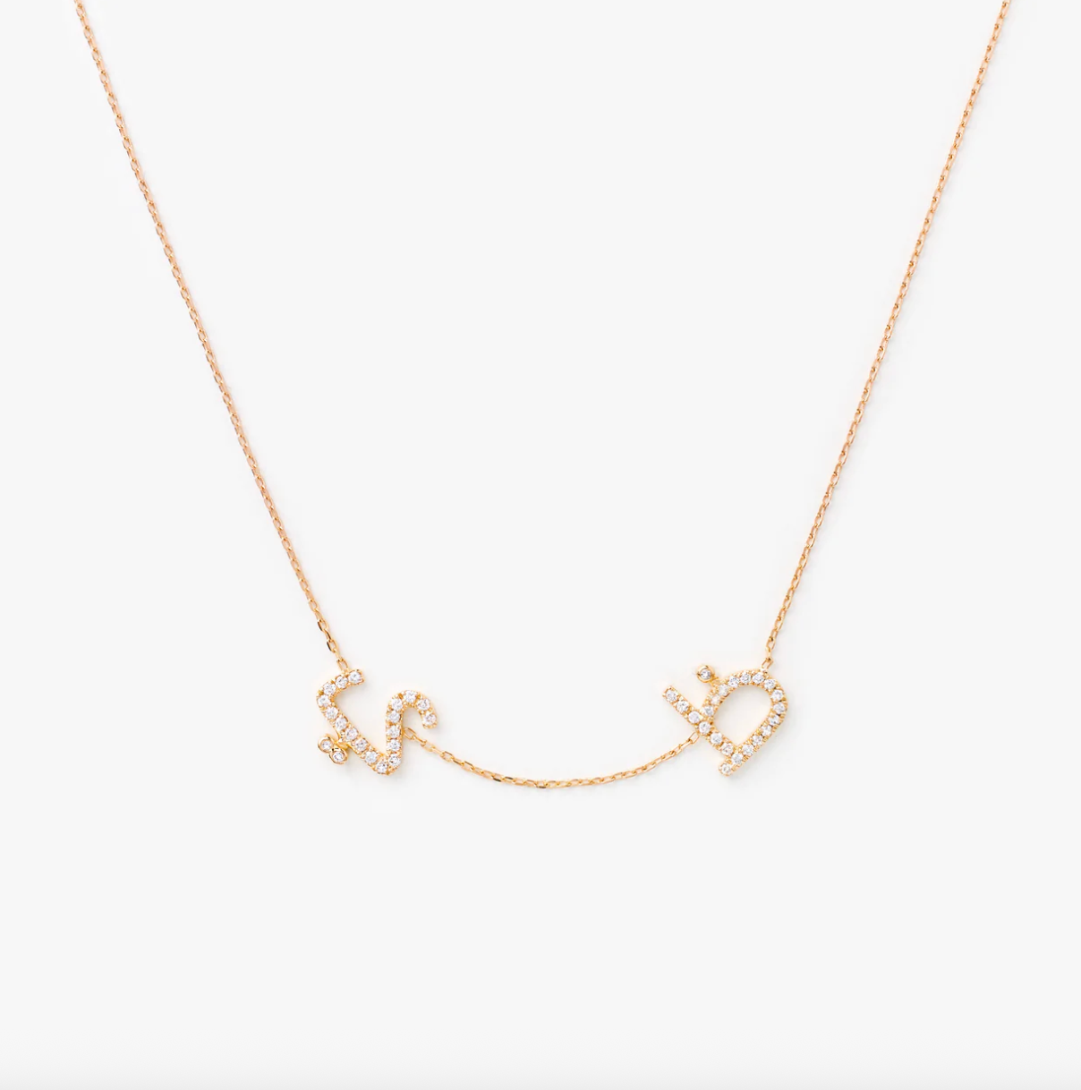 Two letters necklace paved with white diamonds