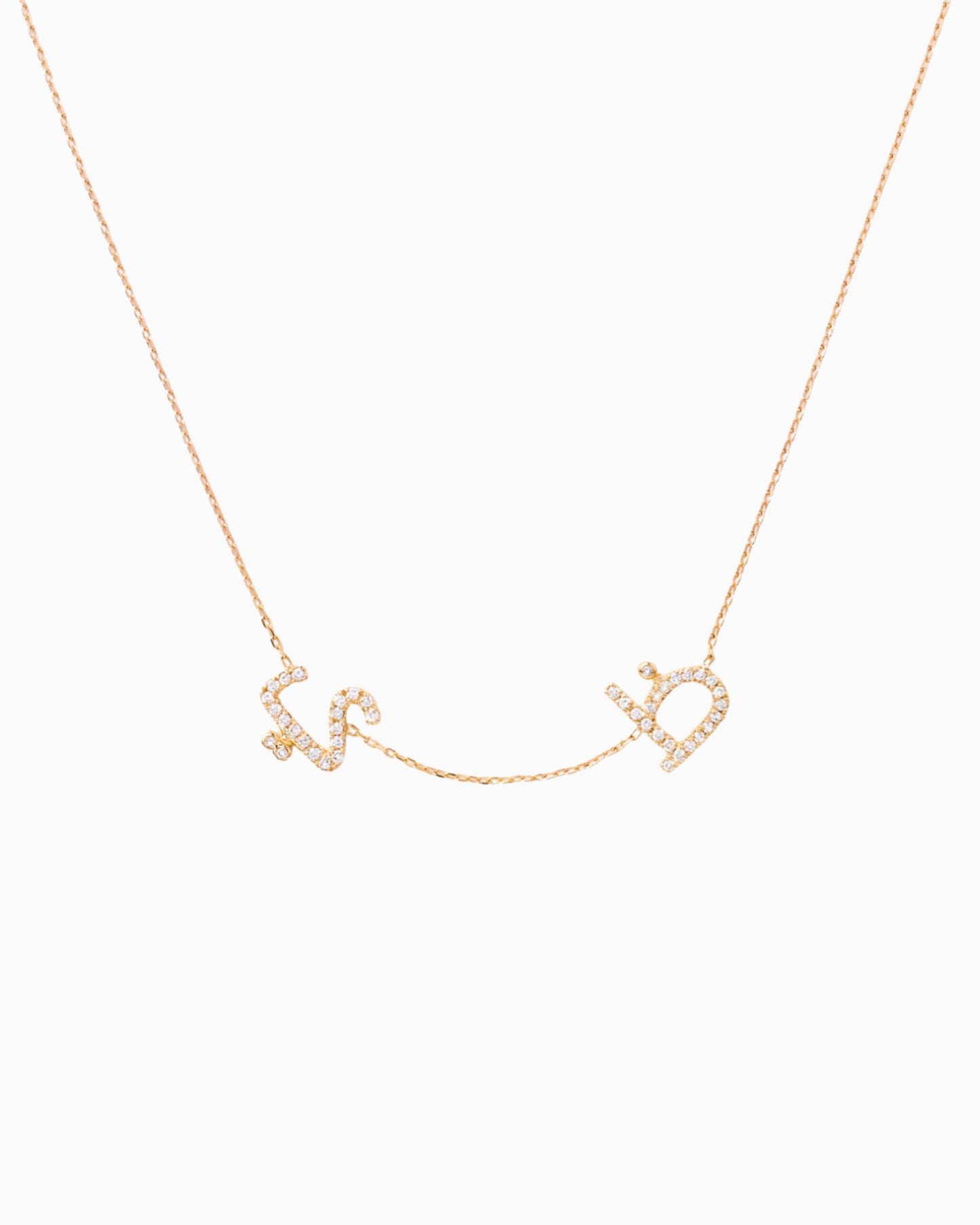 Two letters necklace paved with white diamonds
